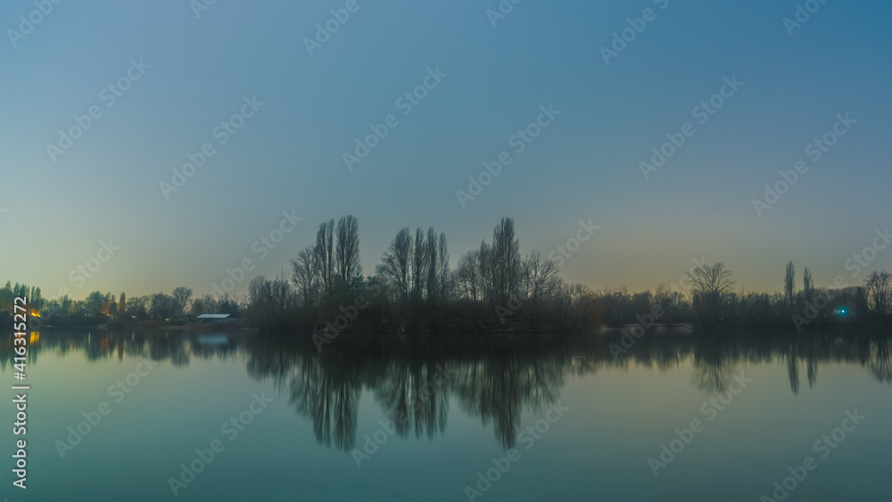 Panoramic landscape with the quarry lake Binsfeldsee near Speyer in Germany. Panoramic landscape with the quarry lake Binsfeldsee near Speyer in Germany.