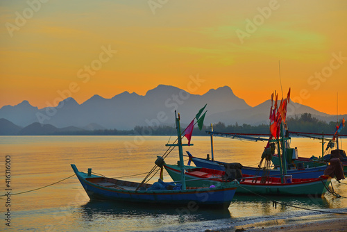 Wallpaper Mural Fishing boat on the beach in evening. Thailand. Torontodigital.ca