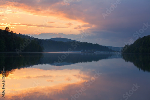 Fototapeta Naklejka Na Ścianę i Meble -  evening by the lake, reflection in the water