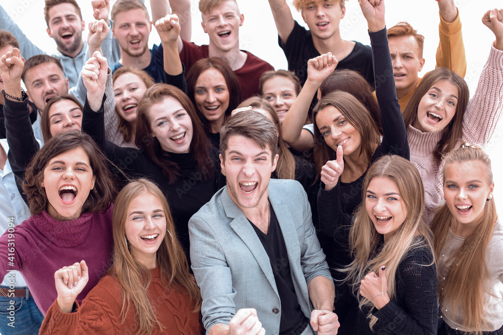 close up. happy young people showing their success close up. happy young people showing their success