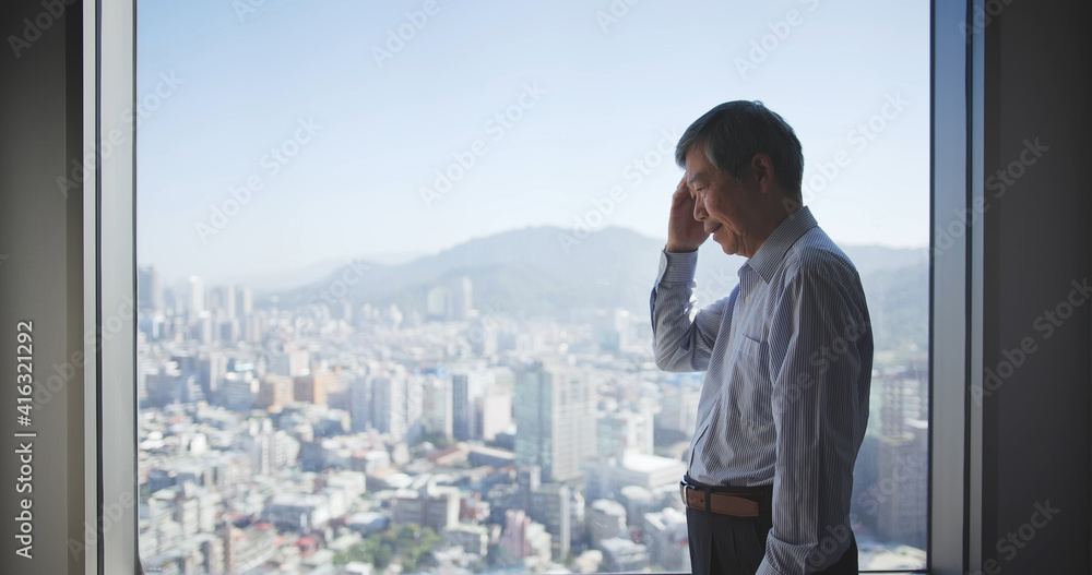Fototapeta premium Stressed senior businessman