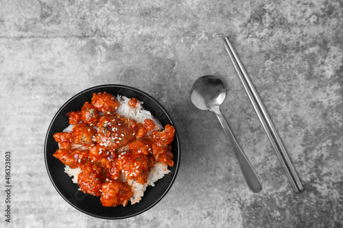 Korean spicy crispy chicken on rice.