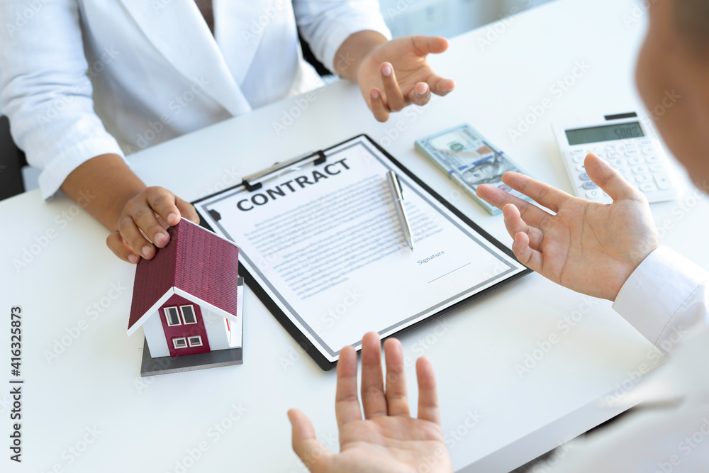 Real estate brokerage agent Offering for sale and contract agreement, home insurance concept. Making lease and buying a house Real estate brokerage agent Offering for sale and contract agreement, home insurance concept. Making lease and buying a house