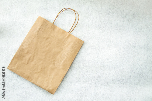 brown paper bag on white background. top view