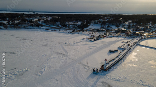 Wawatam lighthouse during winter in St. Ignace, Michigan.