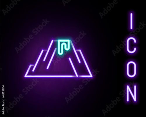 Glowing neon line Volcano eruption with lava icon isolated on black background. Colorful outline concept. Vector.