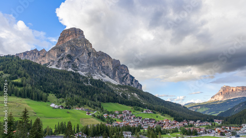 The beautiful alpine town of Corvara in Badia at the foot of the mountain Sassongher. South Tyrol in northern Italy