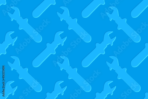 Adjustable wrench seamless pattern. Background from a metal adjustable wrench.