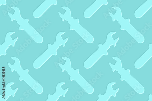 Adjustable wrench seamless pattern. Background from a metal adjustable wrench.