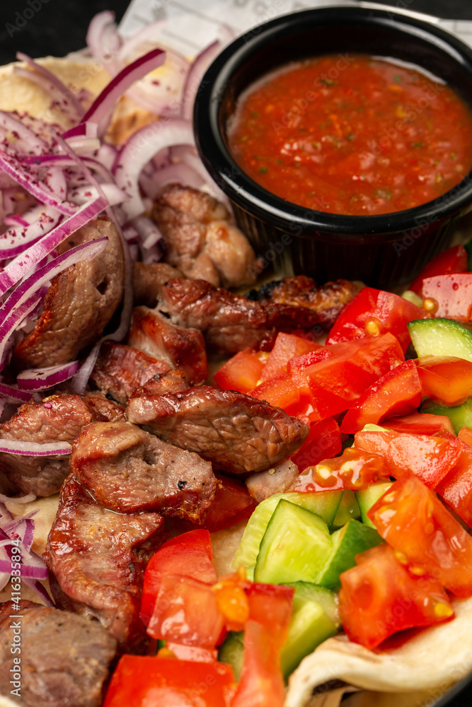 Kebap, roasted meat and vegetables on grill Kebap, roasted meat and vegetables on grill