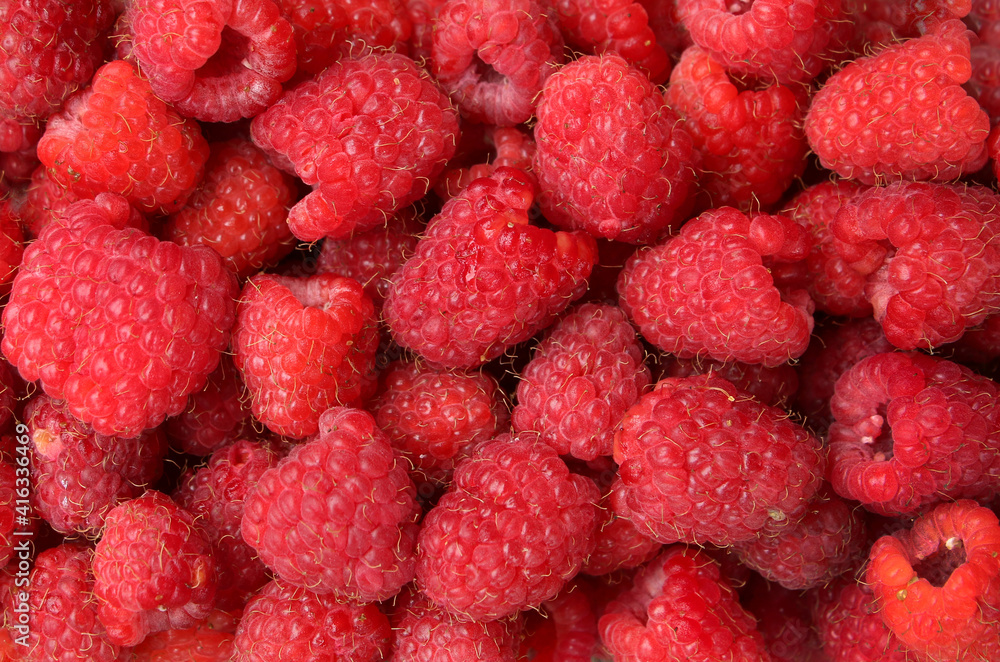 strawberries raspberries a wooden table strawberries raspberries a wooden table