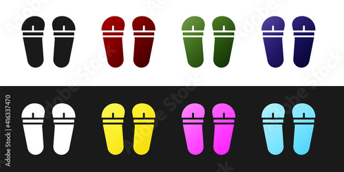 Set Flip flops icon isolated on black and white background. Beach slippers sign. Vector.