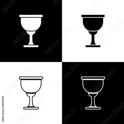 Set Holy grail or chalice icon isolated on black and white background. Christian chalice. Christianity icon. Vector.