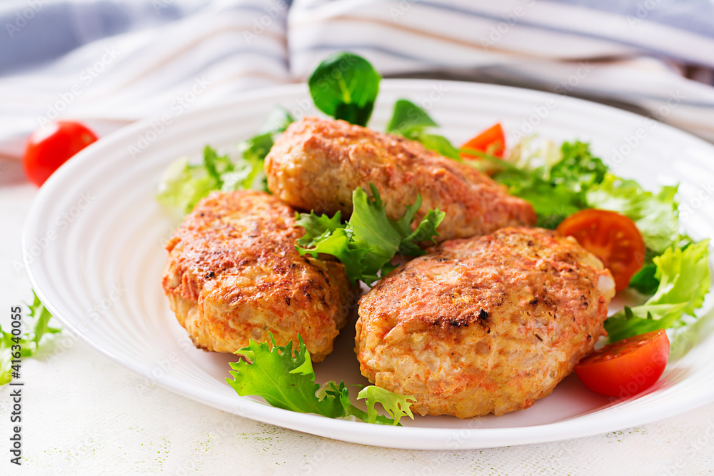 Meatballs with cabbage. Lazy cabbage rolls with fresh salad on light background. Russian cuisine. Meatballs with cabbage. Lazy cabbage rolls with fresh salad on light background. Russian cuisine.