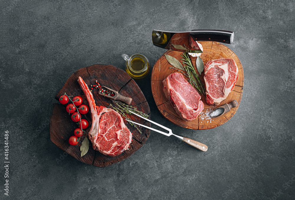 Fresh raw Prime Black Angus beef steaks. Variety of raw beef meat steaks for grilling.