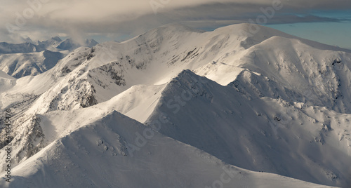 Frozen and snow-capped Tatra peaks © Tomasz