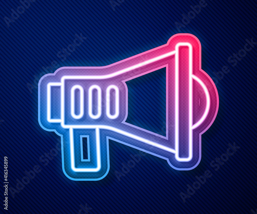 Glowing neon line Megaphone icon isolated on blue background. Speaker sign. Vector.