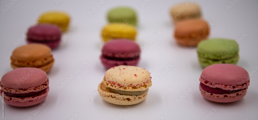 Macaron colorfuls design on white blurred background Macaron colorfuls design on white blurred background
