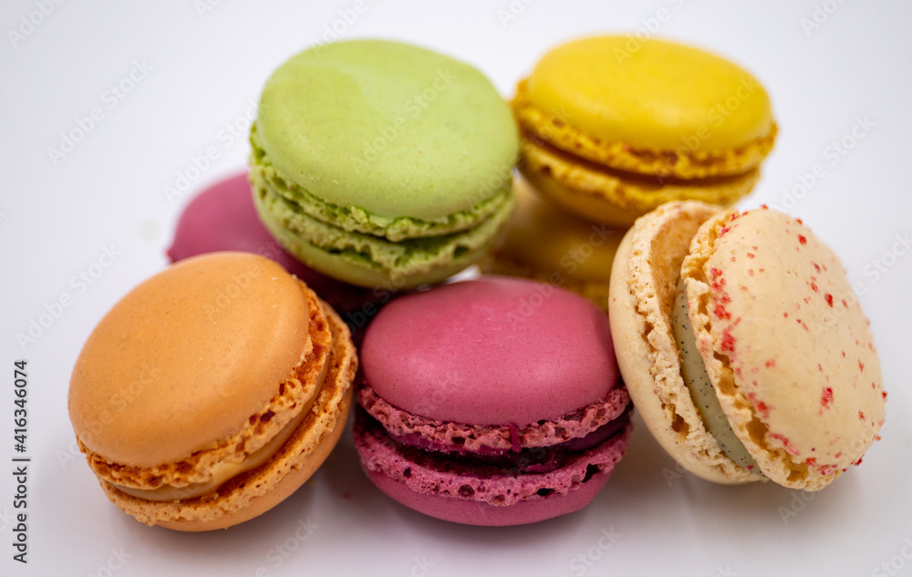 Macarons Macaroon Cookie Dessert from France in a Heap isolated on a white background Macarons Macaroon Cookie Dessert from France in a Heap isolated on a white background