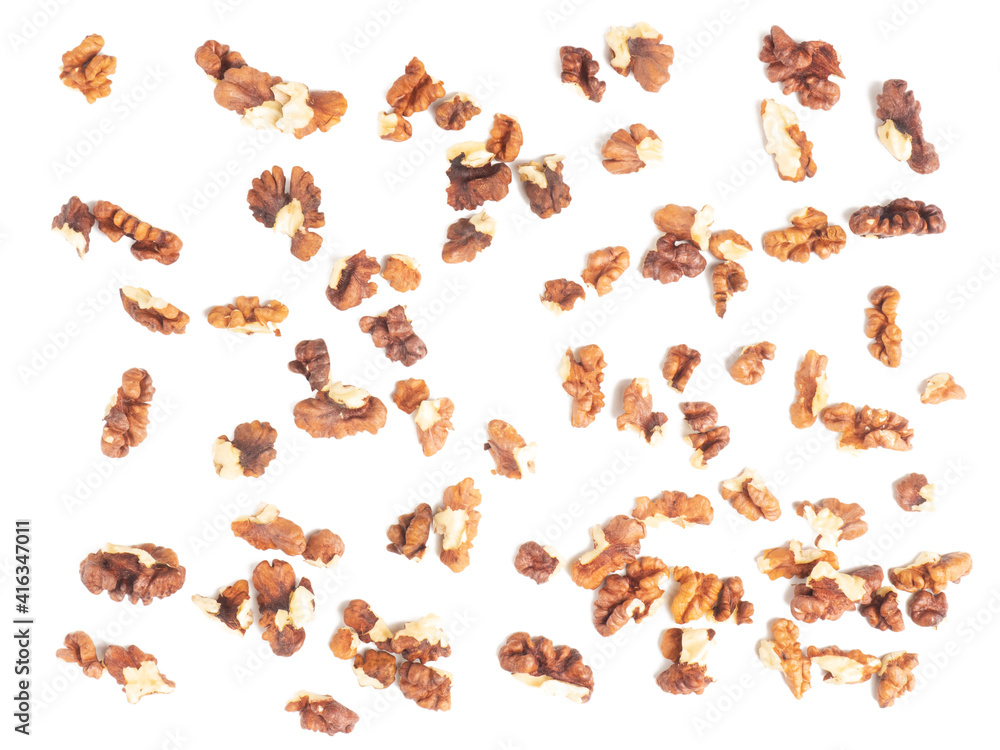 Fototapeta premium Shelled walnuts on white