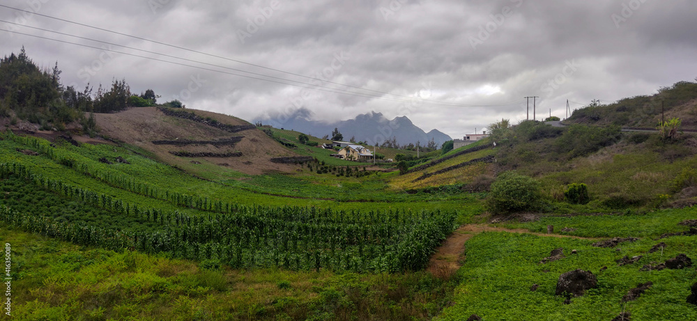 Rural landscape of Cilaos in Îlet à Cordes village with crops, La Réunion, France.