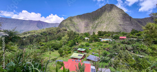 Typical landscape of isolated village in Mafate, tropical countryside, Reunion island, Aurére, France. photo