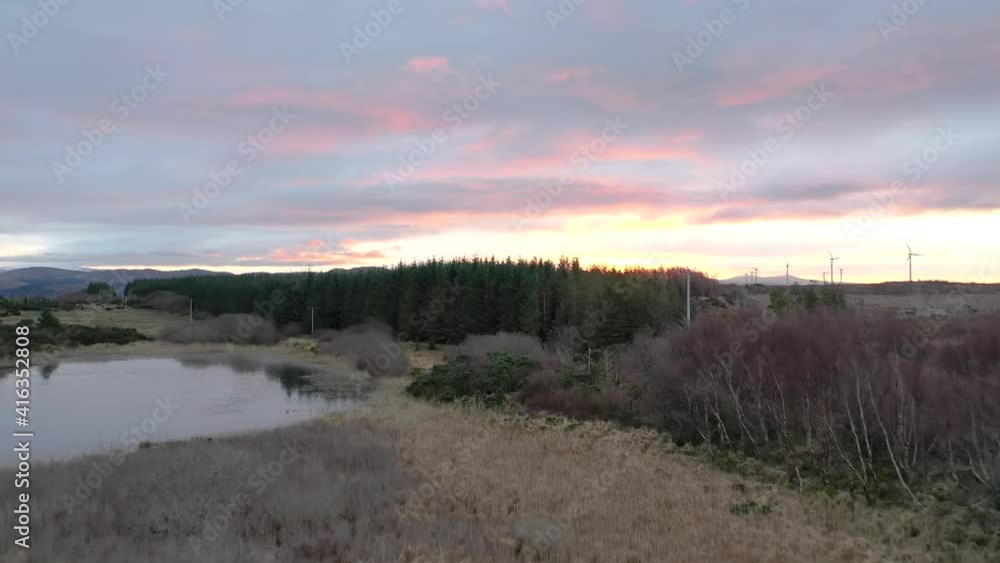 Sunrise over a peatbog by Bonny Glen, Portnoo, in County Donegal - Ireland. Sunrise over a peatbog by Bonny Glen, Portnoo, in County Donegal - Ireland.