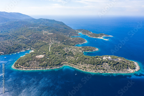 Fototapeta Naklejka Na Ścianę i Meble -  Aerial drone high angle shot of peninsula of Vis Island coastline in Adriatic sea in Croatia summer