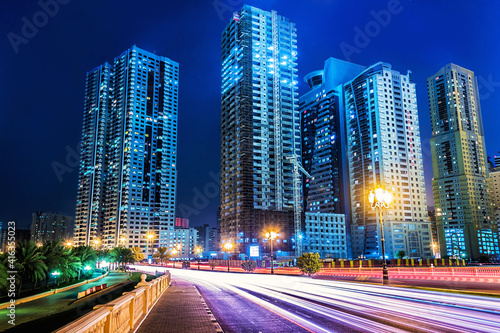 Photography Tail lights of cars on a street in a city at night
