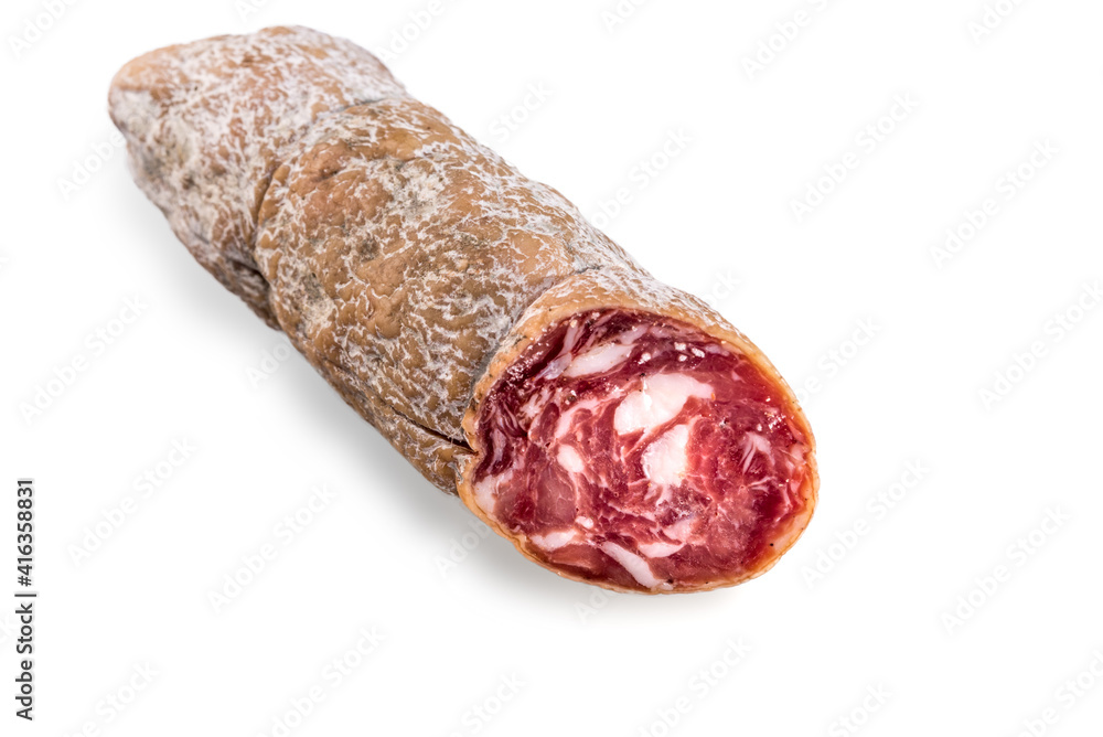Salame Felino Italian, whole sausage cut section view isolated on white Salame Felino Italian, whole sausage cut section view isolated on white