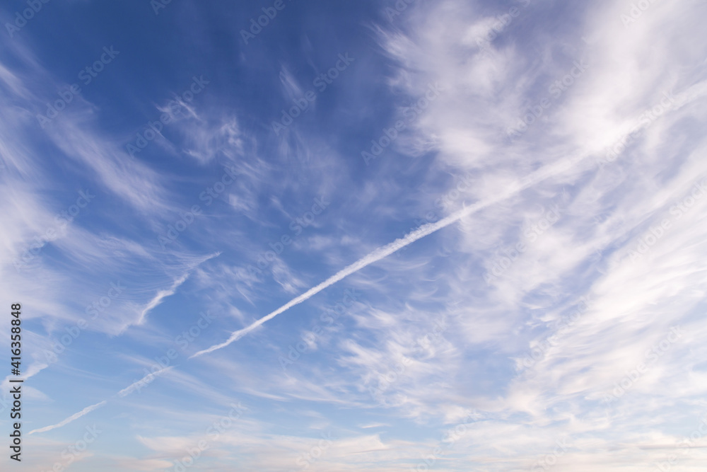 Abstract background texture. Blue sky with white cirrus clouds Abstract background texture. Blue sky with white cirrus clouds