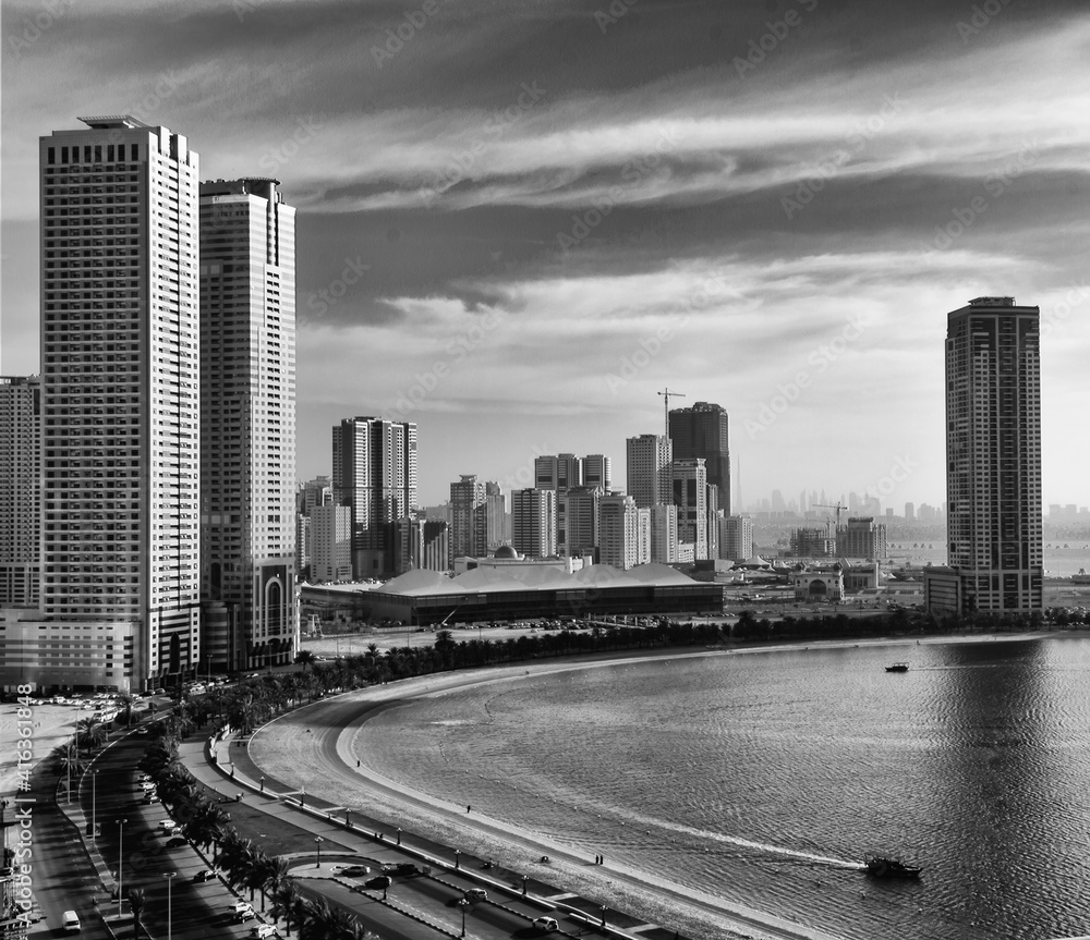 Fototapeta premium Black and white city with clouds and lake