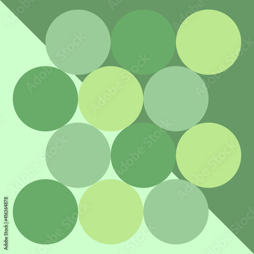 The balls of green variation are arranged to form an abstract but symmetrical shape