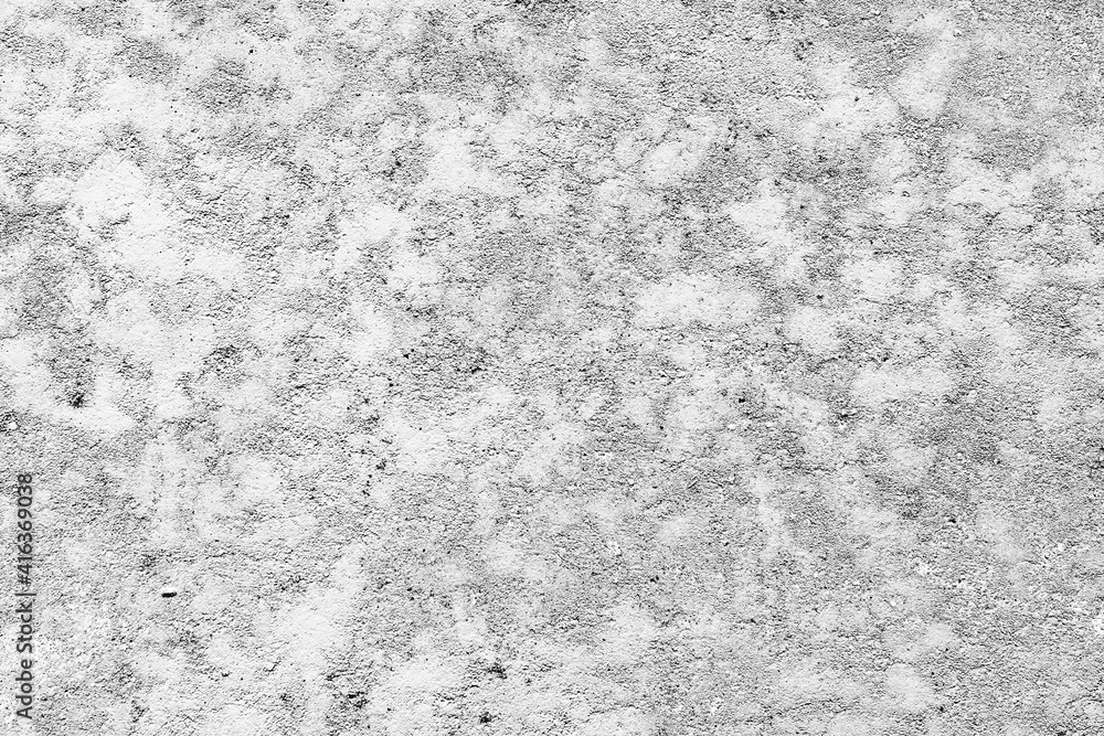 Texture of a concrete wall with cracks and scratches which can be used as a background Texture of a concrete wall with cracks and scratches which can be used as a background