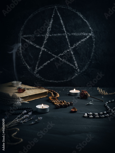 Black magic, the altar with the sign of the pentagram. A ritual to summon the devil or an evil spirit.