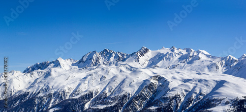 Alps range with Baettlihorn, breithorn, bortelhorn, helsenhorn, monte Cervandone, gross schinhorn, milibach, on the border between Italy and Switzerland. Viewed from Eggishorn in the Winter