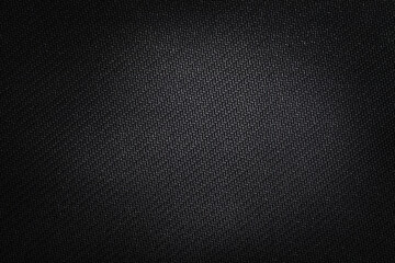 Texture technical fabric with rubber coating. Black background.
