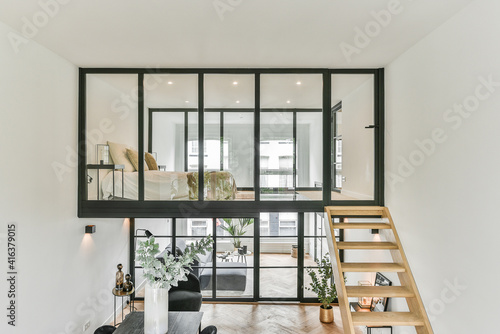 House in an unusual design with glass windows