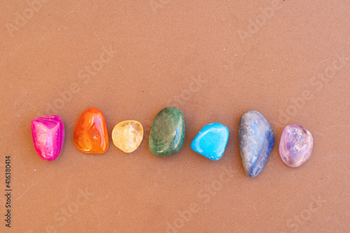 Konstfotografi Healing crystals on brown background
