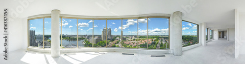Quadro em tela Beautiful view of city from the window in a large spacious corridor