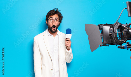 Φωτογραφία young bearded man television presenter.