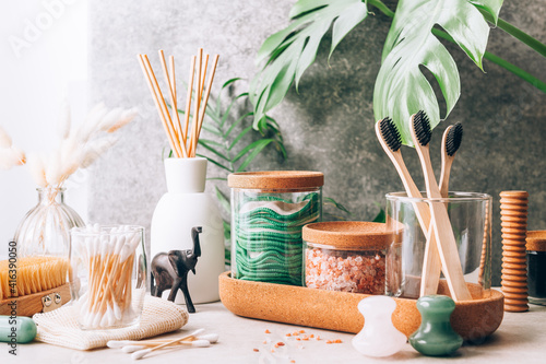 Set of Eco Friendly Bath Items, such as bath salts, reusable cotton pads, diffuser, bamboo toothbrush, jade rollers, natural wooden brush, fresh soap, charcoal powder