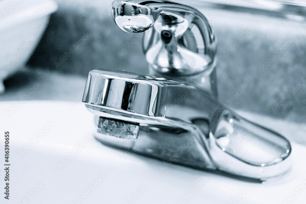 close up of a faucet close up of a faucet
