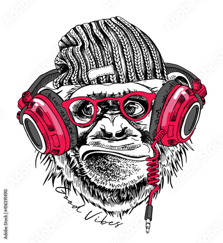 Funny Monkey in a hipster knitted hat, in a glasses and in a pink headphones. Good vibes - lettering quote. Humor card, t-shirt composition, hand drawn style print. Vector illustration.