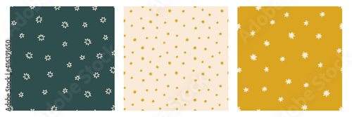 Set of vector random stars backgrounds. Seamless patterns with star doodles. Trendy colors pastel beige, champagne, green, golden. Card templates.