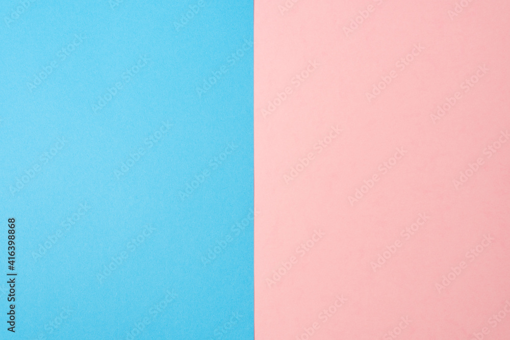 Background of two vertical rectangles blue and pink. Sheets of blank blue and pink paper split vertically. Background of two vertical rectangles blue and pink. Sheets of blank blue and pink paper split vertically.