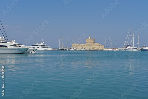 Rhodes island, Greece - Landscape of the Mandraki port and Saint Nicholas Fort © ainophoto