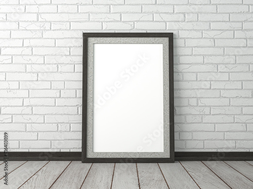 empty blank picture in black wooden frame in room interior