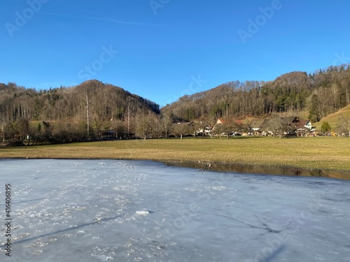 Late winter and early spring on the Türler Lake or Türlersee Lake (Tuerlersee oder Turlersee), Aeugst am Albis - Canton of Zürich, Switzerland (Schweiz) photo