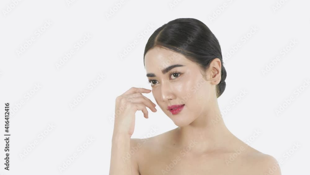 Beauty concept of 4k Resolution. Young Asian woman smiling charmingly on a white background. Beauty concept of 4k Resolution. Young Asian woman smiling charmingly on a white background.